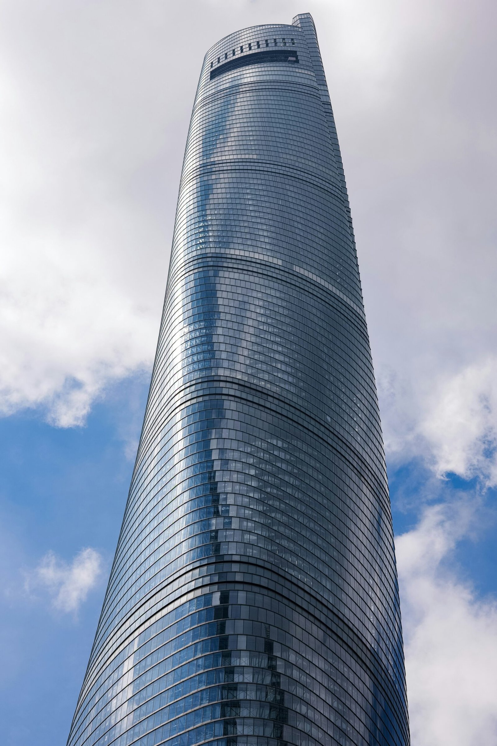 a very tall building with a sky background